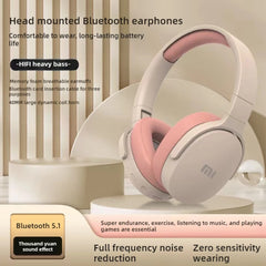 Head-mounted Bluetooth headphones with pink ear cushions on a white background