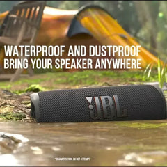 JBL waterproof speaker in a camping setting with text highlighting its features.