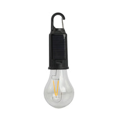 Solar-powered light bulb with carabiner on a white background