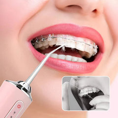Person with braces using a dental flosser, with a close-up inset showing a black and white view of the same action.