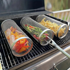 Metal mesh grilling baskets with vegetables on a grill
