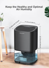 Black dehumidifier with dimensions labeled on a wooden floor.