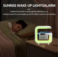 Child sleeping in bed with a sunrise wake-up light alarm clock on a nightstand.