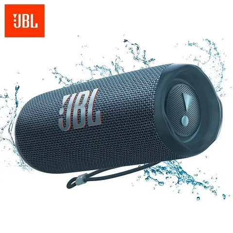 JBL portable speaker with water droplets around it on a white background