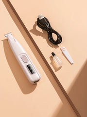 White grooming tool with accessories on a beige background