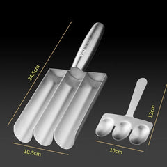 Metal trowel and hand fork with measurements on a black background