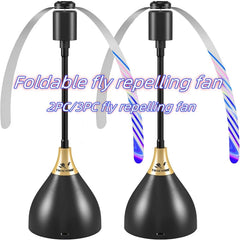 Two foldable fly repelling fans with colorful ribbons on a white background.