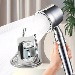 Handheld shower head with flexible hose and mounting bracket on a neutral background