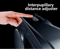 Hand adjusting an interpupillary distance adjuster on eyewear with a black background