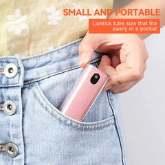 Pink lipstick tube being placed into a pocket with text 'Small and portable'.