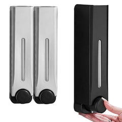 Two soap dispensers, one black and one silver, on a white background.