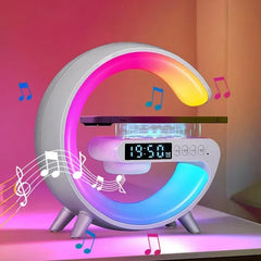 Colorful clock with LED display and musical notes on a pink background