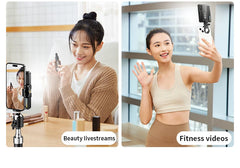 Two women using a smartphone with a selfie stick for beauty livestreams and fitness videos.