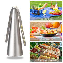 Metallic juicer with images of a picnic, fruit salad, and fruit stand.