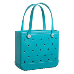 Turquoise handbag with perforated design and brand logo on a white background