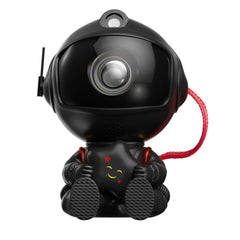 Black robot toy with a smiling face on a white background