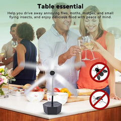 Insect repeller on a table with people enjoying food and drinks, text indicating it helps drive away insects.