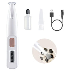 Pet grooming tool set with attachments on a white background