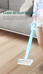 Person using a cordless vacuum cleaner on a wooden floor with text about linear air duct design.