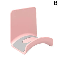 Pink phone stand with gray base on a white background