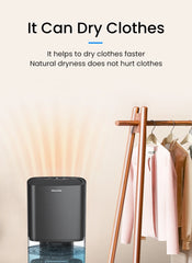 Black dryer with clothes on a rack and text about drying clothes faster.