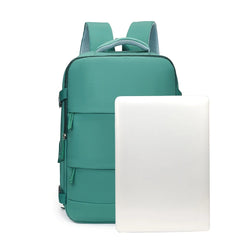 Teal backpack with a white laptop on a white background