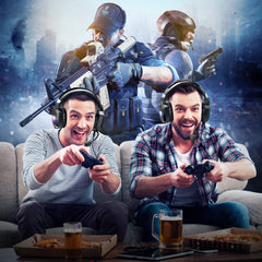 Two men playing video games with a cityscape and action figures in the background