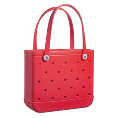 Red handbag with perforated design and visible brand logo on a white background