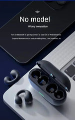 Black wireless earbuds with charging case on a dark surface