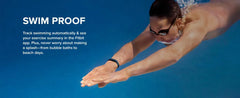 Person swimming with Fitbit tracking device on a blue background