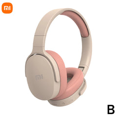 Beige and pink headphones with Xiaomi logo on a white background