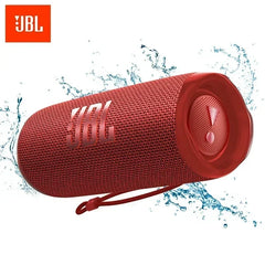 Red JBL speaker with water splashes on a white background
