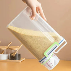 Clear container with lid holding rice on a wooden surface