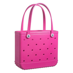 Pink tote bag with perforated design and visible brand logo on a white background