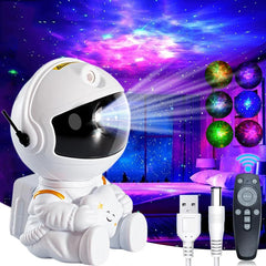 Astronaut toy projector with colorful light display in a room setting.