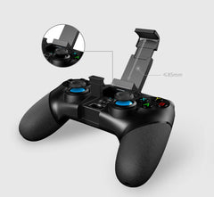 Black gaming controller with close-up details on a light gray background