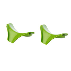 Two green plastic parts on a white background