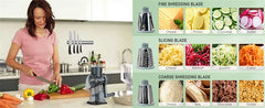 Woman using a manual juicer in a kitchen with various blades and food items displayed.