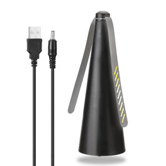 Black cone-shaped device with USB cable on a white background
